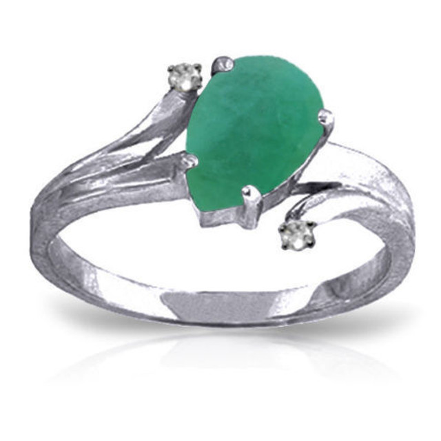 A pear shaped Emerald is embraced in this 14 karat Ring while being protected by two Genuine Diamonds. Since this stone is the birthstone of May, it makes a great gift for a May born girl.