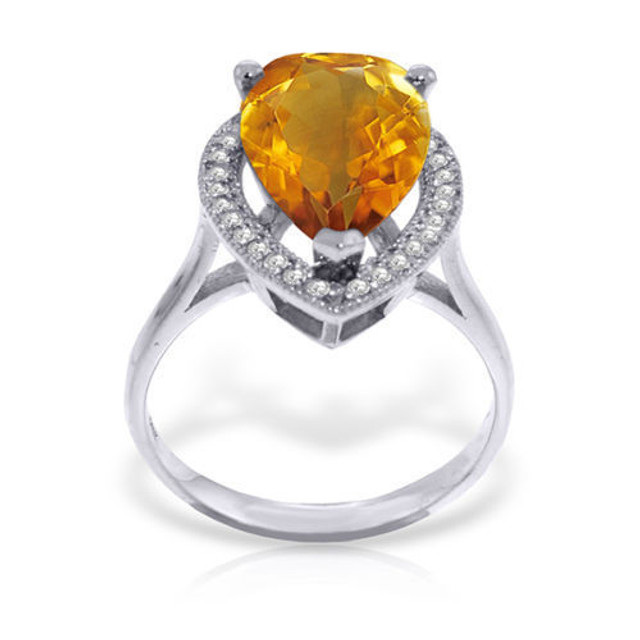 This 14k gold ring with natural diamonds and citrine makes a fabulous November birthstone ring, but is also great for anyone born anytime during the year as a great ring that is wearable everyday. The beautiful band is formed from 14k yellow, white, or rose gold and features a beautiful carved design that makes it stand out and draws attention to the amazing citrine that is the center stone. 