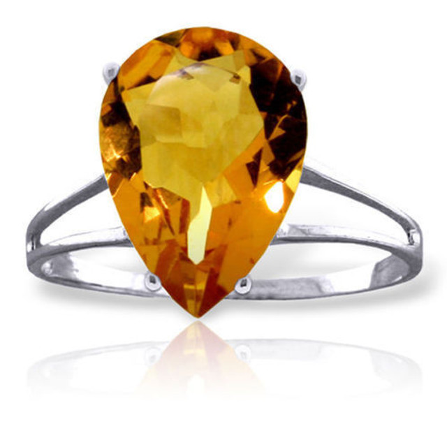 All eyes will be on your gorgeous hands when you hold that Cosmopolitan and this ring reflects in the candlelight of a cocktail party or dinner date that you have so looked forward to. This 14K gold Ring with Natural Citrine features a showy pear shaped five carat Citrine gemstone that is faceted just right. The stone is set on a unique, airy, 14K gold band. Measuring 27.9mm in height and 14mm in width, this ring will be a real conversation piece. Grab it now so it will be ready and waiting for your next big event.