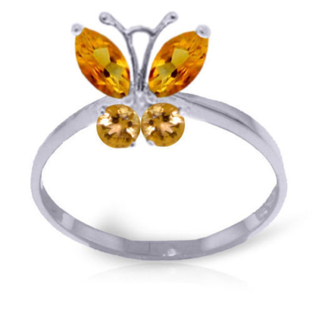 One of nature's most beautiful creates is perfectly immortalized in real gold and genuine gemstones on this 14k gold butterfly ring with natural citrine. Two marquise cut and two round cut stones form the perfect shape of a floating butterfly, with .60 carats of color to make this sparkle beautifully. The butterfly is set on a simple gold band that allows it to stand out perfectly, all while being made of the highest quality 14k yellow, white, or rose gold. This ring is a lovely piece for those who love dainty and feminine pieces, as well as for those with November birthdays.