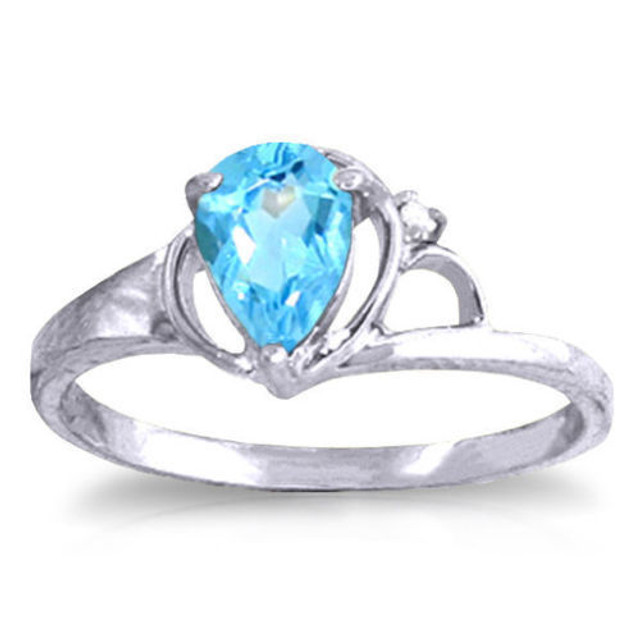 This elegant 14k gold ring will make you feel like a princess. A stunning blue topaz is cradled in tear-drop prong setting. The ring is 8.4mm in width and 22.6mm in height. A small diamond accents the upper portion of the ring to give sparkle and shine, but it is subtle and not overly flashy. The bright blue color works well with the gold ring, and is perfect for regular wear or special occasions. The blue topaz makes it a great birthstone gift as well.
