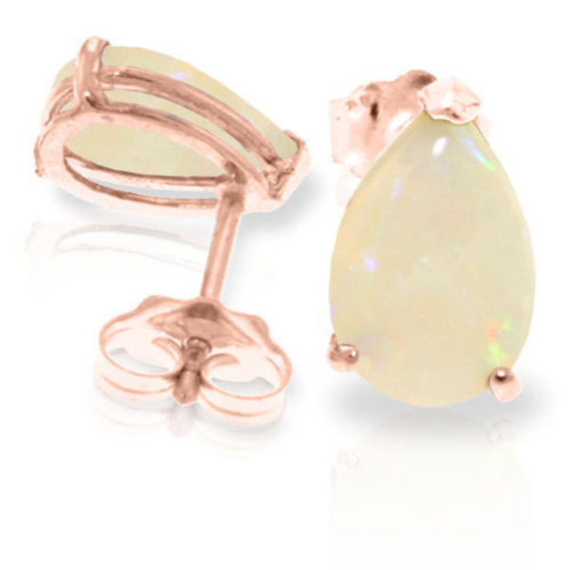 The multicolored opalescence of Opal has no equal in the world of gemstones. Throughout the ages, Opal has mystified people with its ability to catch the light and reflect back many colors. You can enjoy this amazing stone with your own pair of 14K gold Stud Earrings with Natural Opals. Each earring features a 1.55 carat pear shaped Opal gemstone. These stones are set in a stud crafted of 14K gold. This is a pair of earrings that you will want to own forever. That's a good thing, because these babies will LAST for a LIFETIME.