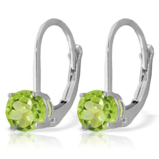 These 14k gold leverback earrings with peridot stones put a twist of style on the look of traditional solitaire gems. The leverback designs make these very stylish, while also holding them securely in place comfortably on the earlobes. Two round cut peridot stones adorn the surfaces of these stunning earrings, with 1.20 carats of dazzle. These earrings are stylish without being too trendy, making them perfect for any woman with any type of style. These make a fun gift to give to a woman celebrating her birthday in August, allowing her to show off the beautiful lime green hue of her dazzling birthstone.