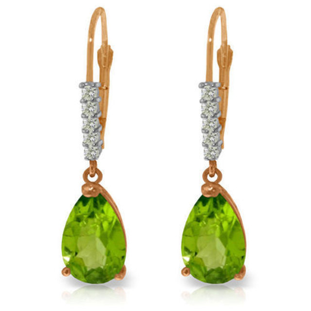 These 14k gold leverback earrings with natural diamonds and peridot are the perfect choice for women who love to wear fun dangling earrings. The leverback style is used to create movement and show off the beautiful diamonds and peridot stones that each pair creates, while being comfortable and sleekly crafted from 14k yellow, white, or rose gold. Ten total diamonds adorn the surface of each pair, with five genuine stones studding each earring. A dangling pear cut solitaire peridot hangs from each setting, each stone weighing 1.50 carats to show off the bright, glowing beauty of August's beautiful birthstone.