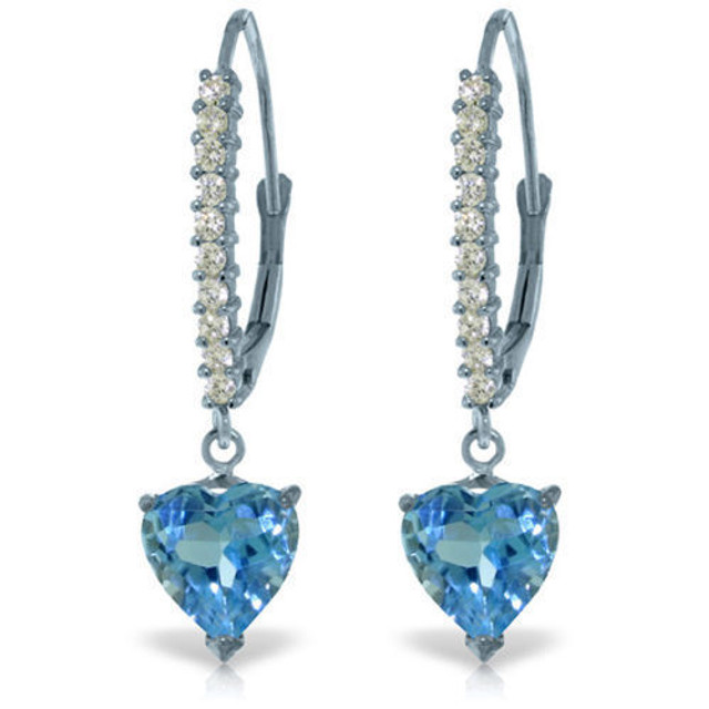 These beautiful and charming 14k gold Lever Back Earrings with natural Diamonds & Blue Topaz are sure to make her smile. Youthful and adorable, these earrings are simply vibrant. Each blue topaz is a lovely heart shape and a total of 3.25 carats for both earrings. There are 20 luxurious round cut diamonds that are a total of 0.30 carats.

These diamonds are I-J in color and SI-1 clarity. These elegant and beautiful earrings make the perfect gift for the princess in your life, but are also suitable for mothers, grandmothers, sisters or a girlfriend. Give them as a birthday, anniversary or holiday gift.