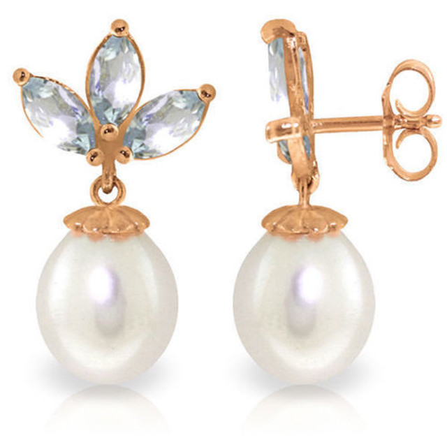  Dainty elegance is what you will get with these 14K rose gold Dangling Earrings with Pearls & Aquamarines. Wear your beautiful hair up in a bun to fully show off these classic beauties. Each earring features a single 8 carat pear shaped white Pearl and three marquis shaped 1.50 carat semiprecious Aquamarine gemstones.


These earrings are secured by post-friction pushbacks. The setting is crafted of 14K rose gold for a lifetime of enjoyment. Wear these to dinner, to the theater, or to a special party. If tasteful elegance is what you seek, then look no further; it is to be found right here.