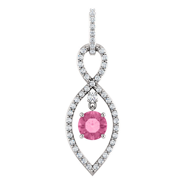 A round natural pink sapphire framed in round diamonds in this stunning necklace for her. Crafted of 14K white gold, the pendant has a total diamond weight of 3/8 carat.