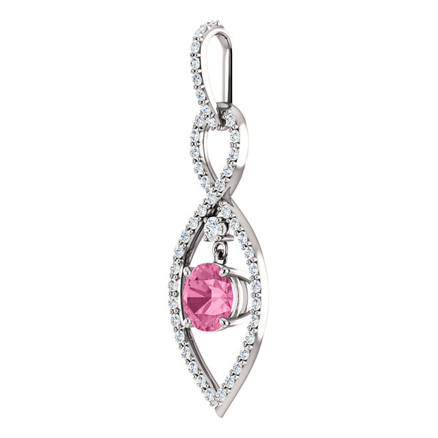 A round natural pink sapphire framed in round diamonds in this stunning necklace for her. Crafted of 14K white gold, the pendant has a total diamond weight of 3/8 carat.