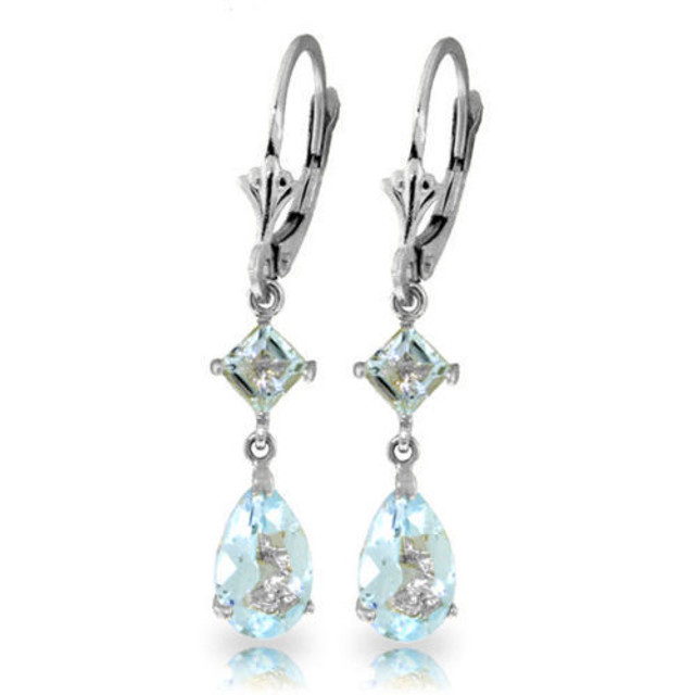  The light blue hues of aquamarine gemstones add soft and subtle elegance to any jewelry that they adorn. These 14k white gold leverback earrings with aquamarine stones look as heavenly as a clear blue sky. Two square shaped stones measuring at a full carat are draped from the solid gold leverbacks. Two additional pear shaped stones cascade down adding an additional three and a half carats of sparkling beauty. These earrings are subtle enough to wear in the office, but versatile enough to be worn for a night out on the town.