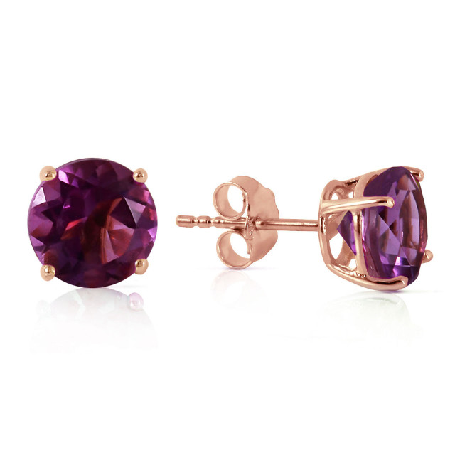 Solitaire studs are one of the most popular styles of earrings that are a simple way to look stylish and beautiful. These 14k rose gold stud earrings with natural amethyst are easy to wear and appropriate to wear at any time. With a 3.10 carat combined weight, these stunning gems are large enough to attract attention without being overwhelming. The bold purple color of these stones also help them to stand out as a stunning pair of earrings that are perfect for any occasion.