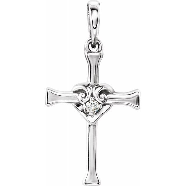 A classic diamond cross pendant. A single small diamond set in a heart at the center. The diamond is genuine and natural, fully cut, weighing .025 carats.