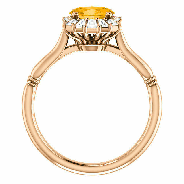 Crafted in 14k rose gold, this ring features one oval Genuine Citrine gemstone accented with 18 genuine diamonds. 