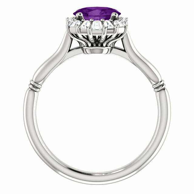 Crafted in sterling silver, this ring features one oval Genuine Amethyst gemstone accented with 18 genuine diamonds. 