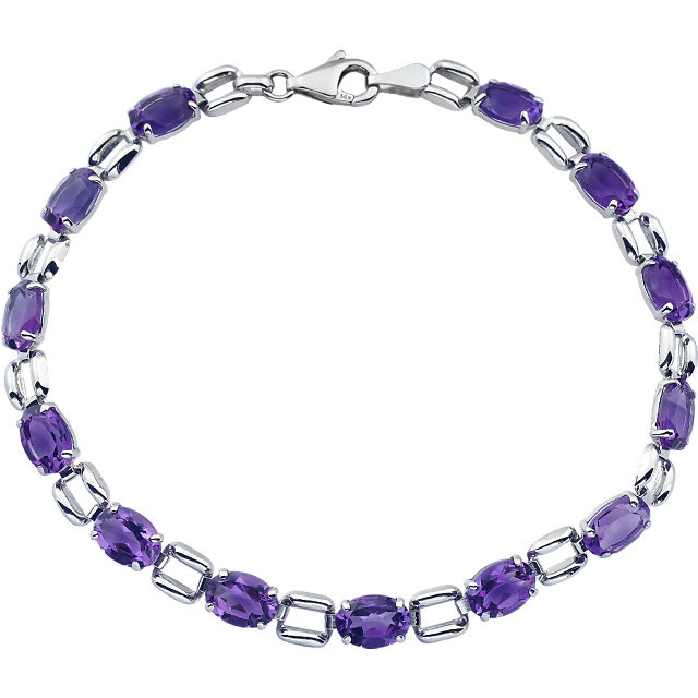 Simply spectacular, this stunning fine bracelet will win the February-born birthday girl's heart! Fashioned in 14K White Gold, this eye-catching bracelet is lined with glistening 07.00x05.00mm amethyst stone - a colorful take on tradition. Polished to a brilliant shine, this is a 7.15 inch bracelet. 