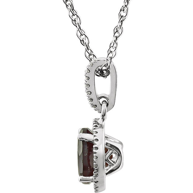 Garnet and Diamond 14k White Gold Halo-Styled 18" inch Birthstone Pendant Necklace. A 7.0mm Genuine Round Garnet is surrounded by 1/10 ct.tw. of Sparkling Genuine Round Diamonds.