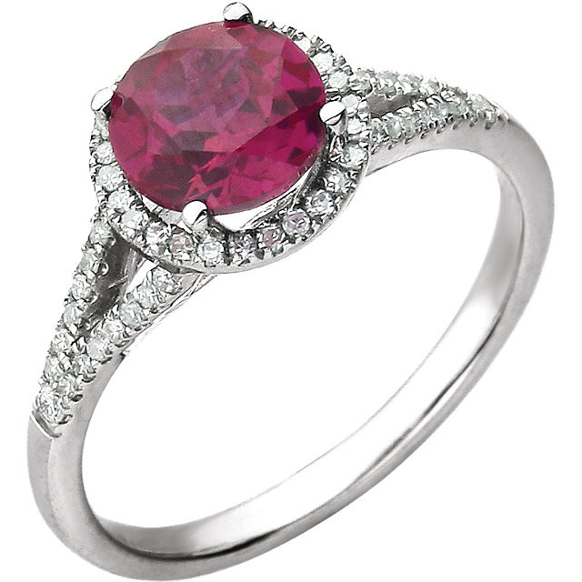 Beautiful Halo-style Gemstone Ring in 14K White Gold featuring a created ruby ring Gemstone & Diamonds. The ring consist of 1 Round Shape, 7.0 mm, Created Ruby Gemstone with 56 Accent genuine Diamonds. This ring is both Elegant and Classic - Perfect for everyday. The inherent beauty of these gems make this an ideal way for you to show your love to someone you care for.