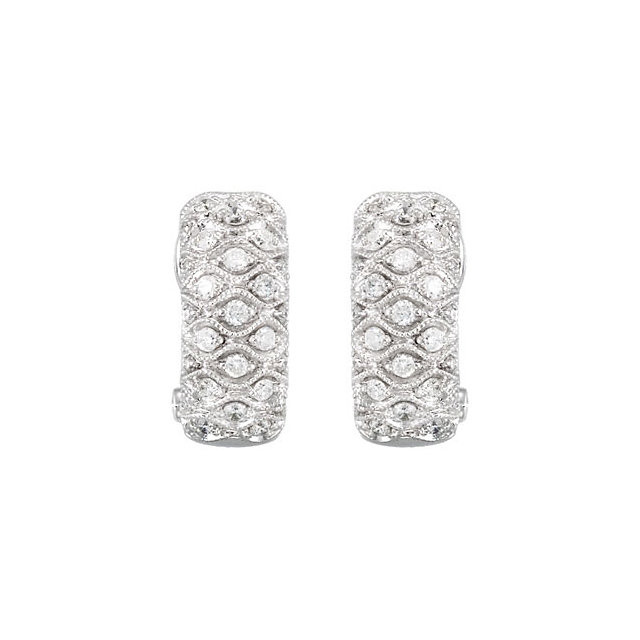 Aim to impress. A stunning pair of diamond earrings are always beautiful regardless of the occasion. Imagine showing off these 3/4 ct. tw. channel set diamond earrings during your next formal party. The stylish look of these luxurious earrings will illuminate any gown you choose to wear!

    Hip style keeps you fashionable.
    54 shimmering round diamonds.
    Strong design for years of beauty.

Lustrous. This 3/4 ct. tw. round diamond earrings set is surrounded by 14K white gold can be both formal and casual. The diamonds have a very good round-cut, G-I color grade and I1 clarity rating.