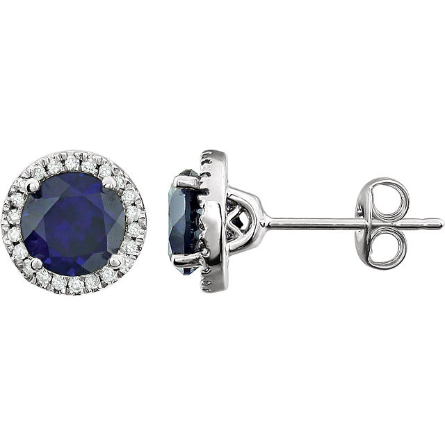 A beautiful crafted 14k white 1/8 ct tw diamond & 6mm blue sapphire friction post stud September birthstone earrings. Sapphire is the birthstone of September, has been popular since the Middle Ages and, according to folklore, will protect your loved ones from envy and harm. Medieval clergy wore sapphires to symbolize heaven, while commoners thought the gem attracted heavenly blessings. Sapphire is a variety of the gem species corundum and occurs in all colors of the rainbow. Blue, pink, purple, green, orange, or yellow corundum are known by their color.