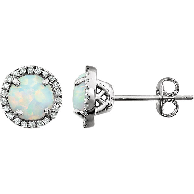 A beautiful crafted 14k white 1/8 ct tw diamond & 6mm opal friction post stud October birthstone earrings. Opal is one of two birthstones used for the month of October. The name opal comes from the Greek Opallos, meaning to see a change of color. Opals range in color from milky white to black with a mixture of orange, white, red, green and blue. An opal's beauty is the contrast between its colors. Opal is a formation of non-crystalline silica gel that seeped into the sedimentary strata. 