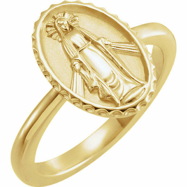 This 14k yellow gold symbolic ring features an oval miraculous medal. 