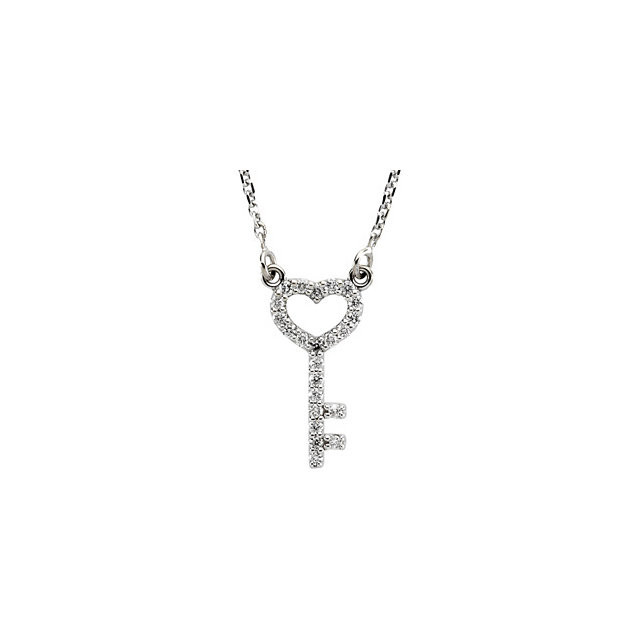 This petite heart & key crafted from 14k white gold is prong set with 23 full cut round diamonds and represents safety, trust, love and security. Attached to the open-heart bow is a 1mm diamond-cut cable chain that is 16-inches long and finished with a spring ring clasp. Pendant measures approximately 14mm long by 7mm wide. 1/8 of a carat total diamond weight.