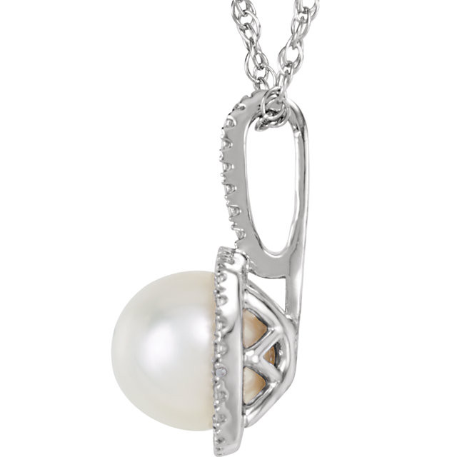 This dazzling fashion pendant makes a huge statement of fabulous style. Created in sleek sterling silver, this design showcases a 7.0mm cultured freshwater pearl center stone. A lovely look any time, this pendant is finished with a bright polished shine and suspends along an 18.0-inch chain. 