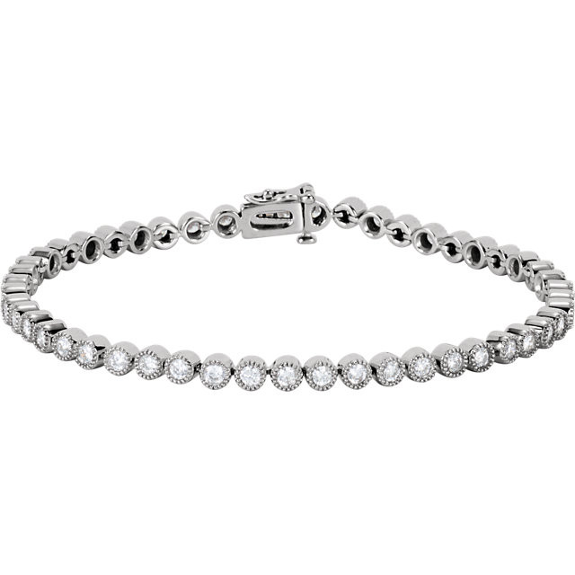Awe-inspiring and alluring, this tennis bracelet is a winner all around. Beautifully crafted in cool 14K white gold, this stunning style bracelet features a set with 2 cts. t.w. of shimmering round diamonds, each with a color ranking of H+ and a clarity of I2. An exceptional design, this bracelet measures 7.25 inches in length and secures with a tongue and groove clasp.