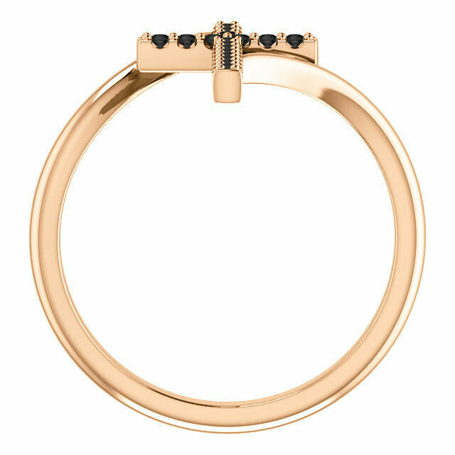 Express your faith with this 14k rose gold cross ring that is accented with seventeen black diamonds for a bold look. Certain to become a treasured favorite, this ring captivates with 1/8 ct. t.w. of diamonds and a polished shine.