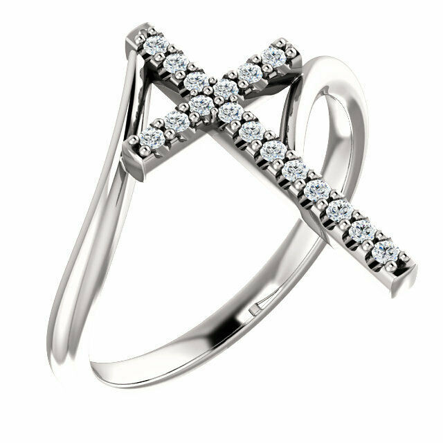 Share your faith for all to see with this sparkling diamond cross ring. Certain to become a treasured favorite, this ring captivates with 1/8 ct. t.w. of diamonds and a polished shine. Diamonds are G-H in color and I1 or better in clarity.