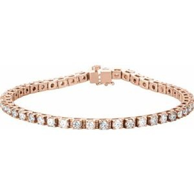 Beautifully crafted, this lab-grown diamond tennis bracelet features forty-six round, brilliant diamonds that are set in a four-prong straight line design. 