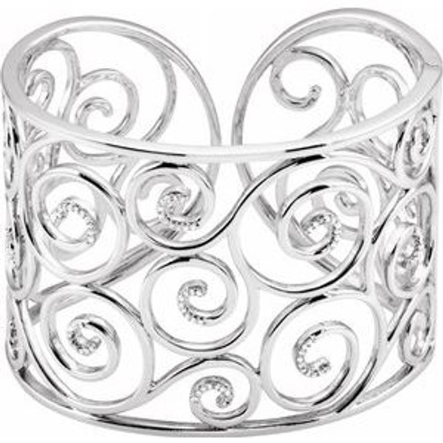 Elegant, geometric and intricate, illuminate your wrist in this sterling silver bracelet. A bangle of beauty, outlined in diamonds form a decorative pattern. Perfect for parties or an afternoon with friends, this 7.0-inch cuff is rich with diamonds totaling 3/8 ct.