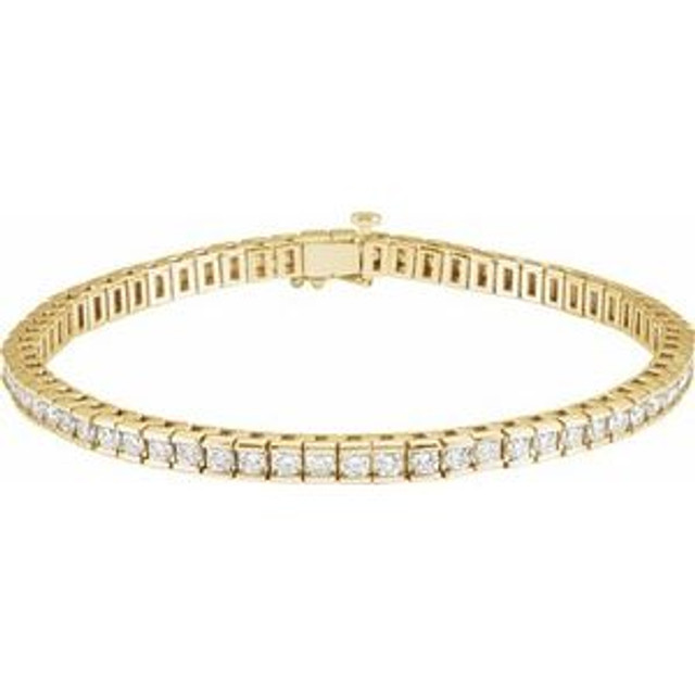 This fabulous 4.00 ct. t.w. diamond tennis bracelet is a breathtaking piece that we really love. Sparkling and sensational, it's a classic that features a stream of round full cut diamonds so gorgeous that it will have heads turning for a second look. 14kt yellow gold bracelet. 