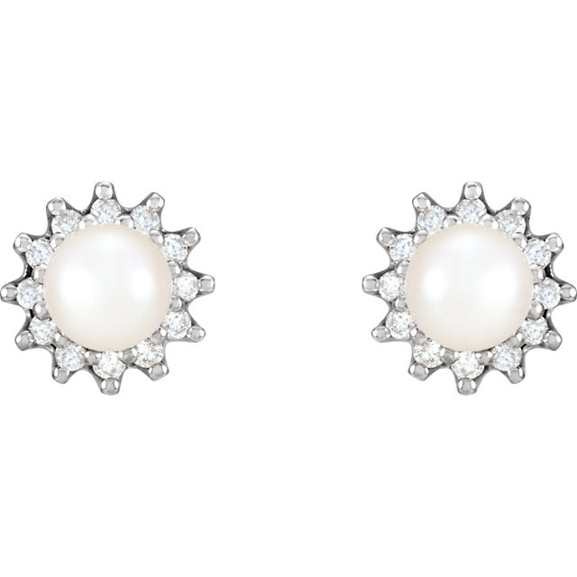 These elegant 14k gold earrings each feature a 6mm Akoya cultured pearl. Diamonds are 1/3 ct. tw., G-H in color and I1 or better in clarity. Polished to a brilliant shine.