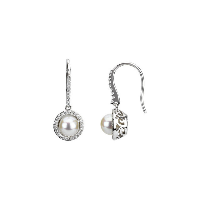 These elegant 14k white gold earrings each feature a white cultured pearl with diamond accents. Diamonds are 1/2ctw, G-H in color, and I1 or better in clarity. Polished to a brilliant shine.
