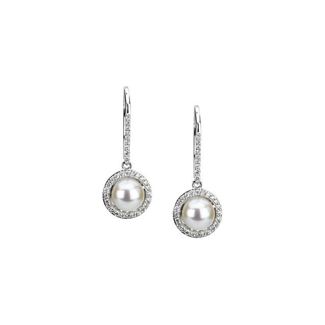 These elegant 14k white gold earrings each feature a white cultured pearl with diamond accents. Diamonds are 1/2ctw, G-H in color, and I1 or better in clarity. Polished to a brilliant shine.
