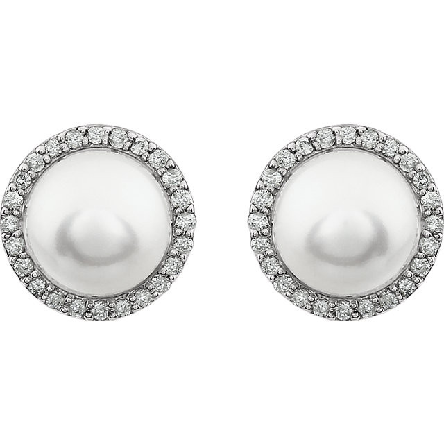 These elegant earrings feature a pair of lustrous cultured pearls, each accented with 24 twinkling diamonds. The earrings, with a total diamond weight of 1/4 carat, are crafted in 14K white gold and a bright polish to shine.