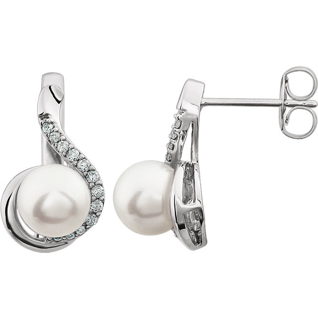 These elegant 14k white gold earrings each feature a 7-7.5mm freshwater cultured pearl with diamond accents. Diamonds are 1/5ctw, G-H in color, and I1 or better in clarity.
