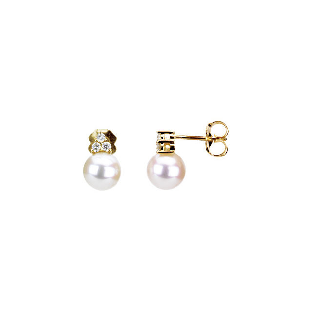 These elegant 14k yellow gold earrings each feature a white freshwater cultured pearl with diamond accents. Diamonds are 1/8ctw, G-H in color, and I1 or better in clarity. Polished to a brilliant shine.