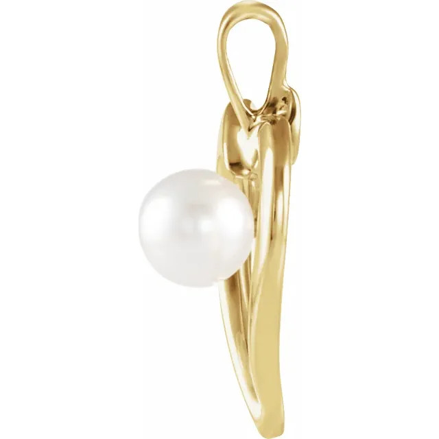 This classic akoya cultured pearl heart pendant style will add shimmering elegance to any ensemble.