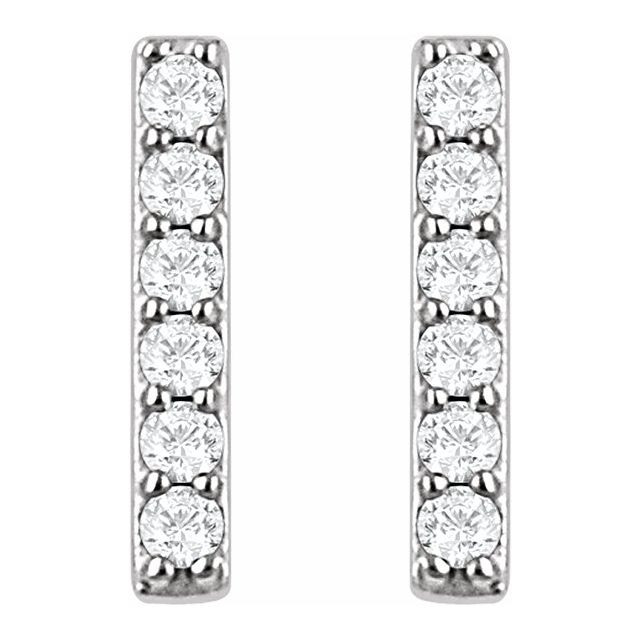 These fashionable earrings are pave set with stunning white diamonds to create an elegant glitter. The lustrous platinum setting enhances the beauty, and creates a simple yet luxurious vertical bar.