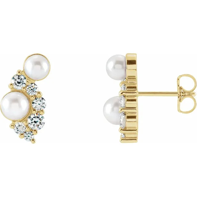 These beautiful pearl earrings feature four lustrous AA+ quality 4.0-4.5mm white Akoya pearls. The pearls are mounted on 14k yellow gold with dazzling I1 clarity diamonds.