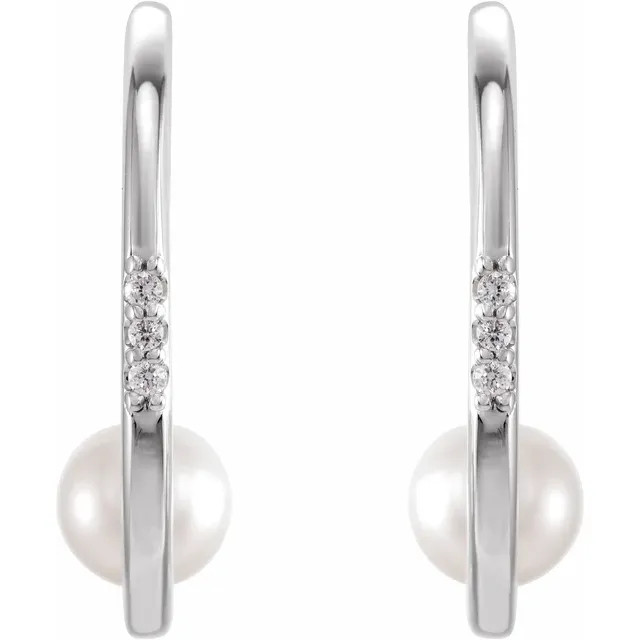 Graceful and elegant, these pearl and diamond drops offer a sophisticated look for the modern woman.