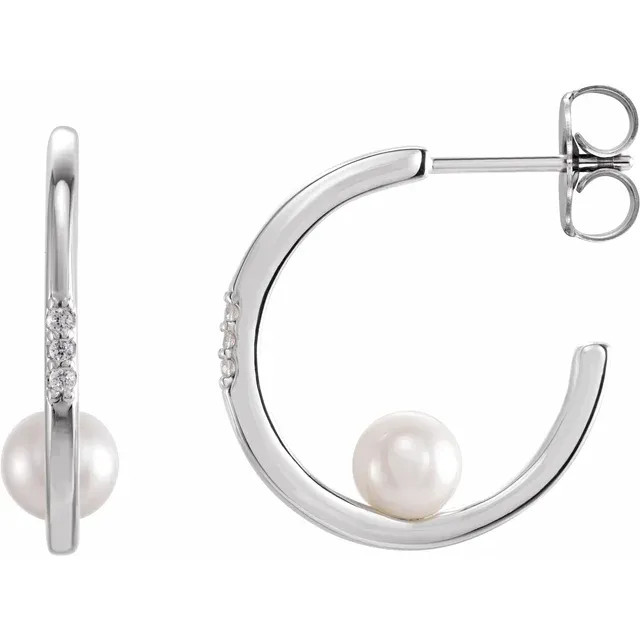 Graceful and elegant, these pearl and diamond drops offer a sophisticated look for the modern woman.