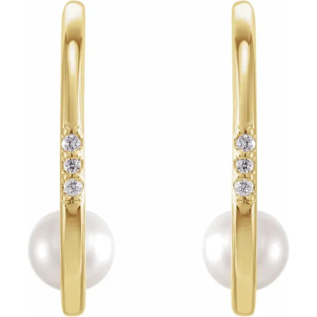 Graceful and elegant, these pearl and diamond drops offer a sophisticated look for the modern woman.