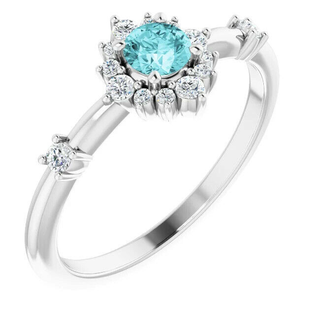 A beautiful choice to express your affection, this gemstone and diamond ring is certain to receive a positive response.