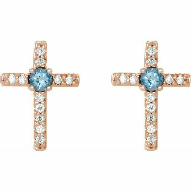 Keep your faith close to you wearing these exquisite diamond & aquamarine cross earrings.