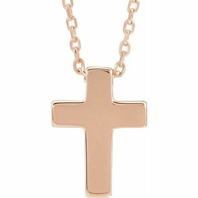 The simplicity of your faith is represented by this rose gold cross 16-18" adjustable necklace. Polished to a brilliant shine. 