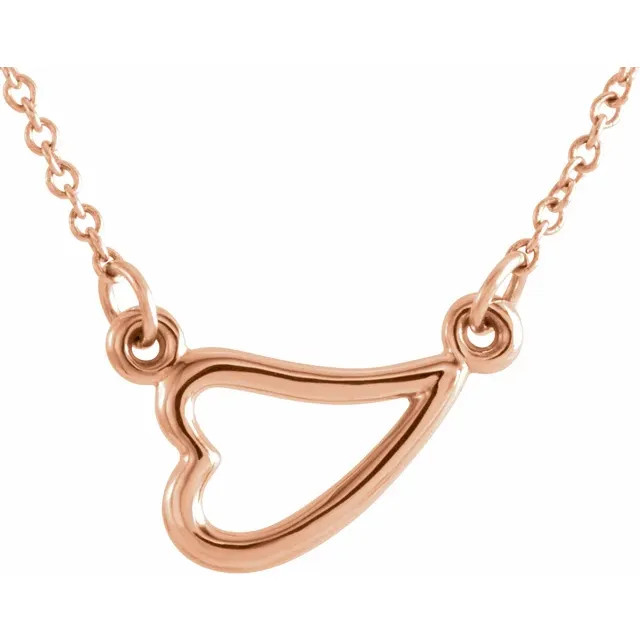 Heart Shaped Necklace in 14k rose gold that Comes with an Adjustable Chain 16-18". Polished to a brilliant shine.