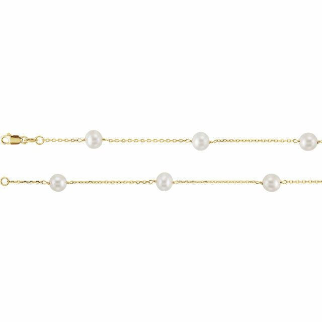 Elevate any attire with this simple yet stunning pearl station necklace. Polished to a brilliant shine.