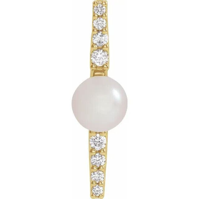 Make a bold and modern fashion statement with this cultured freshwater pearl & Diamond Pendant in 14k yellow gold showcased by 8 sparkling accent diamonds set off by a singular freshwater cultured freshwater pearl.

Cultured freshwater pearls measure approximately 6mm to 6.5mm in diameter. Diamonds are rated I1 for clarity, G-H for color, with 1/6 total carat weight. 